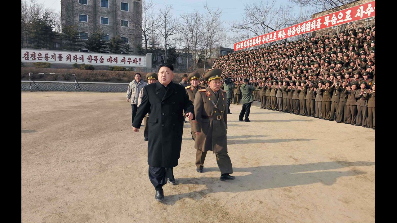 Kim inspects the command of an army unit in this undated photo released Sunday, January 12, by the KCNA.