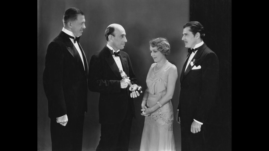 <strong>Mary Pickford (1930):</strong> In 1930, there were actually two Oscar ceremonies. Actress Mary Pickford, seen here, receives her best actress Oscar in April 1930 for her performance in the 1929 film "Coquette."
