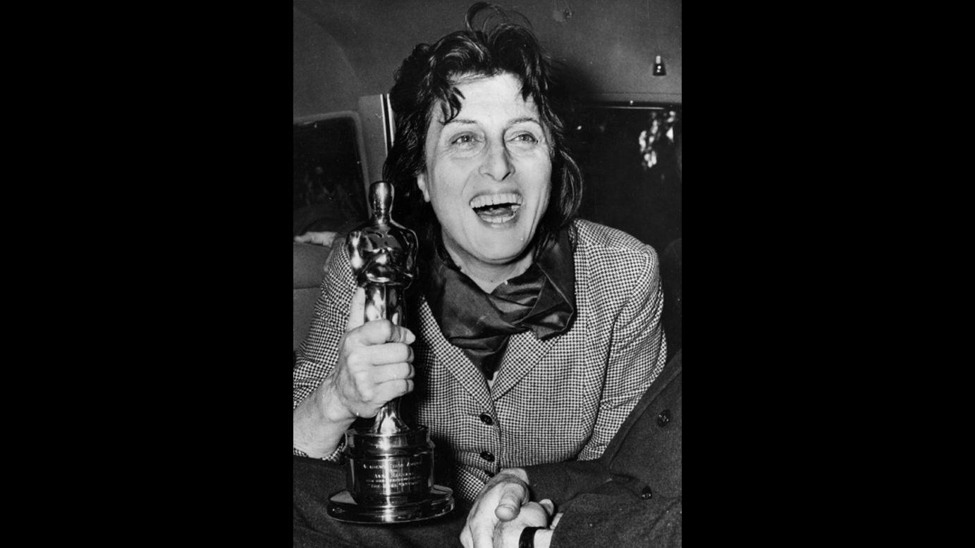 <strong>Anna Magnani (1956):</strong> Anna Magnani enthusiastically holds the Oscar she won for "Rose Tattoo." The award was presented to her by U.S. Ambassador Clare Luce at the Villa Taverna in Rome. 