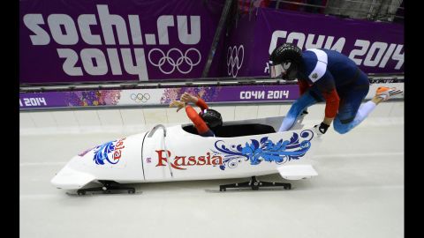 Russian bobsledders Alexander Kasjanov and Maxim Belugin start a run during the two-man competition on February 17.