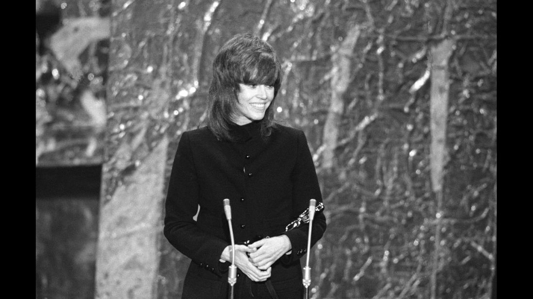 <strong>Jane Fonda (1972):</strong> Jane Fonda cradles the best actress Oscar she received for "Klute."