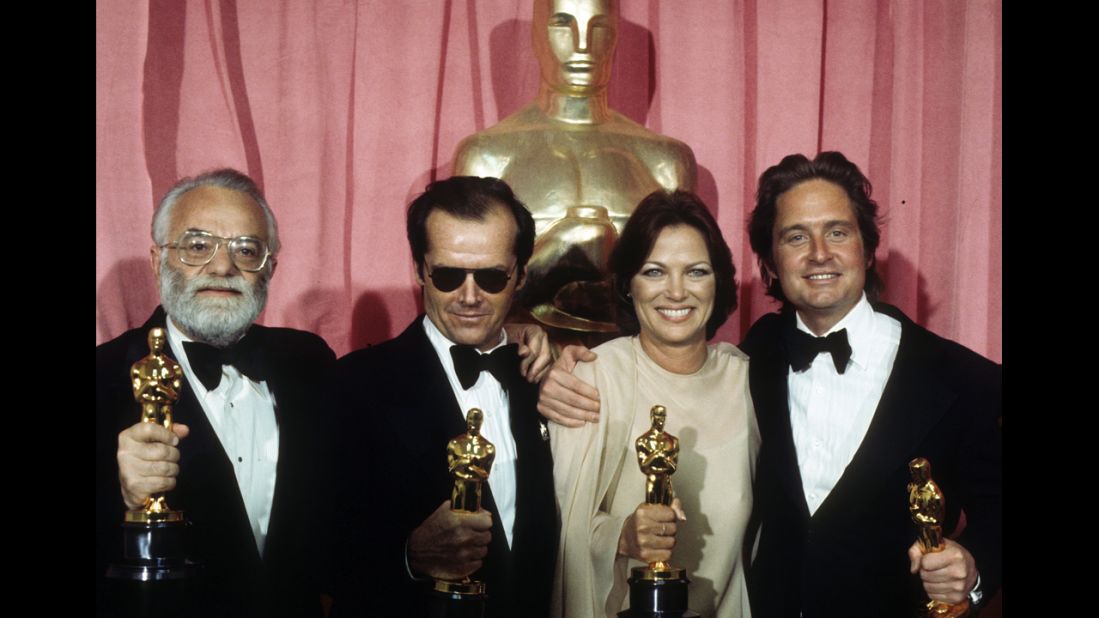 <strong>Louise Fletcher (1976):</strong> From left, producer Saul Zaentz, actor Jack Nicholson, actress Louise Fletcher and producer Michael Douglas pose with their Oscars at the 1976 Academy Awards ceremony. They all won for the film "One Flew Over the Cuckoo's Nest," which swept the major categories that year.