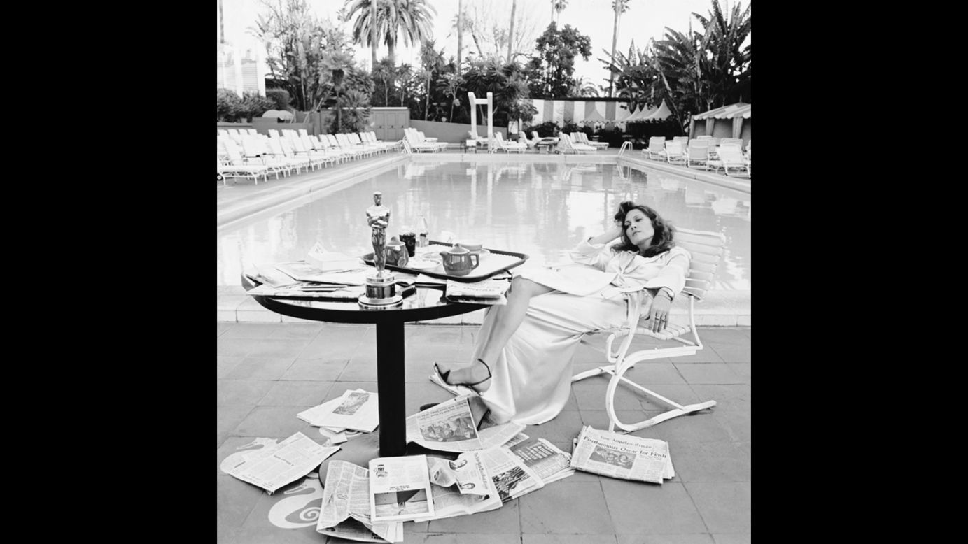 <strong>Faye Dunaway (1977):</strong> Faye Dunaway rests by the Beverly Hills Hotel swimming pool the morning after she received the best actress Oscar for "Network."