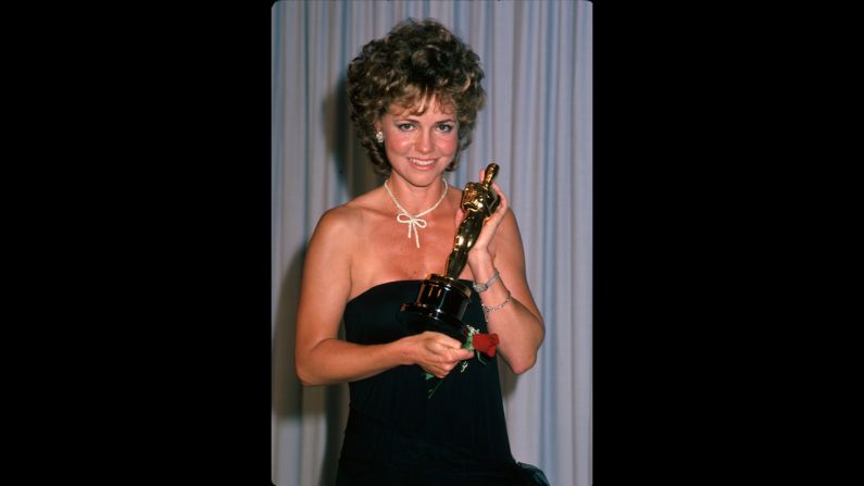 <strong>Sally Field (1985):</strong> Sally Field holds the best actress Oscar in the press room at the Academy Awards. She won the award, her second, for her role in "Places in the Heart."