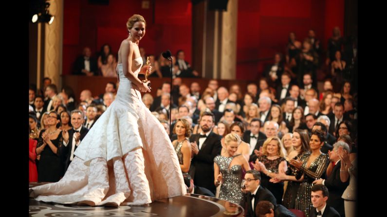 <strong>Jennifer Lawrence (2013):</strong> Jennifer Lawrence charms the audience in 2013 as she accepts the best actress Oscar for her performance in "Silver Linings Playbook."