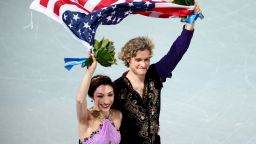 SOCHI, RUSSIA - FEBRUARY 17:  Gold medalists Meryl Davis and Charlie White of the United States celebrate during the flower ceremony for the Figure Skating Ice Dance on Day 10 of the Sochi 2014 Winter Olympics at Iceberg Skating Palace on February 17, 2014 in Sochi, Russia.  (Photo by Clive Mason/Getty Images)