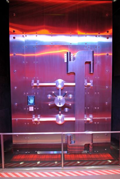 The vault's door features several high-tech security locks. Adding to the show factor is special lighting and fake smoke effect. 