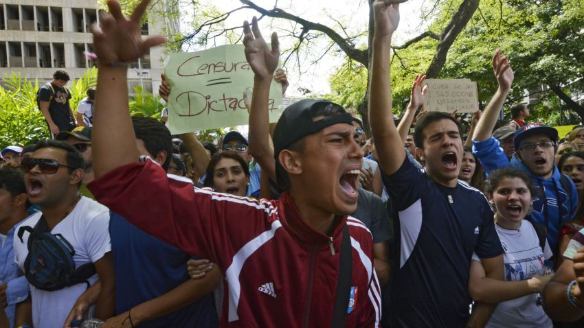 Students take part in an anti-government protest in Caracas on February 17, 2014. 