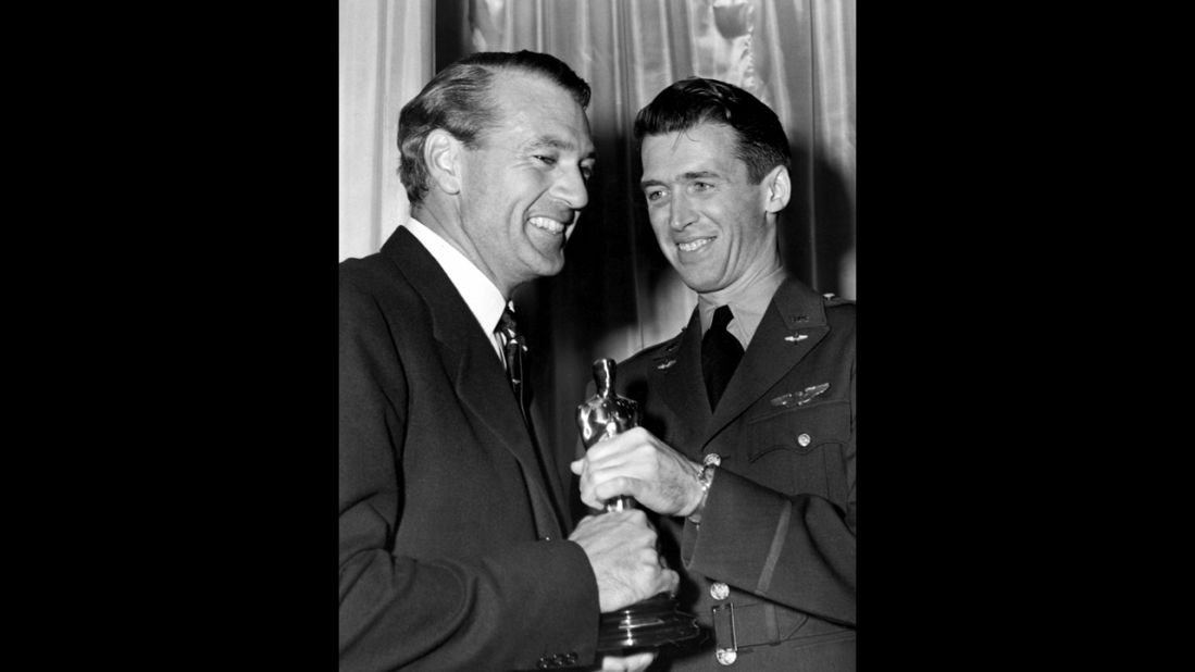 <strong>Gary Cooper (1942):</strong> James Stewart, right, bestows pal Gary Cooper with the statuette for "Sergeant York." Cooper nabbed the win over Orson Welles, whose "Citizen Kane" also lost out on the best picture award but has become the epitome of a Hollywood classic. 