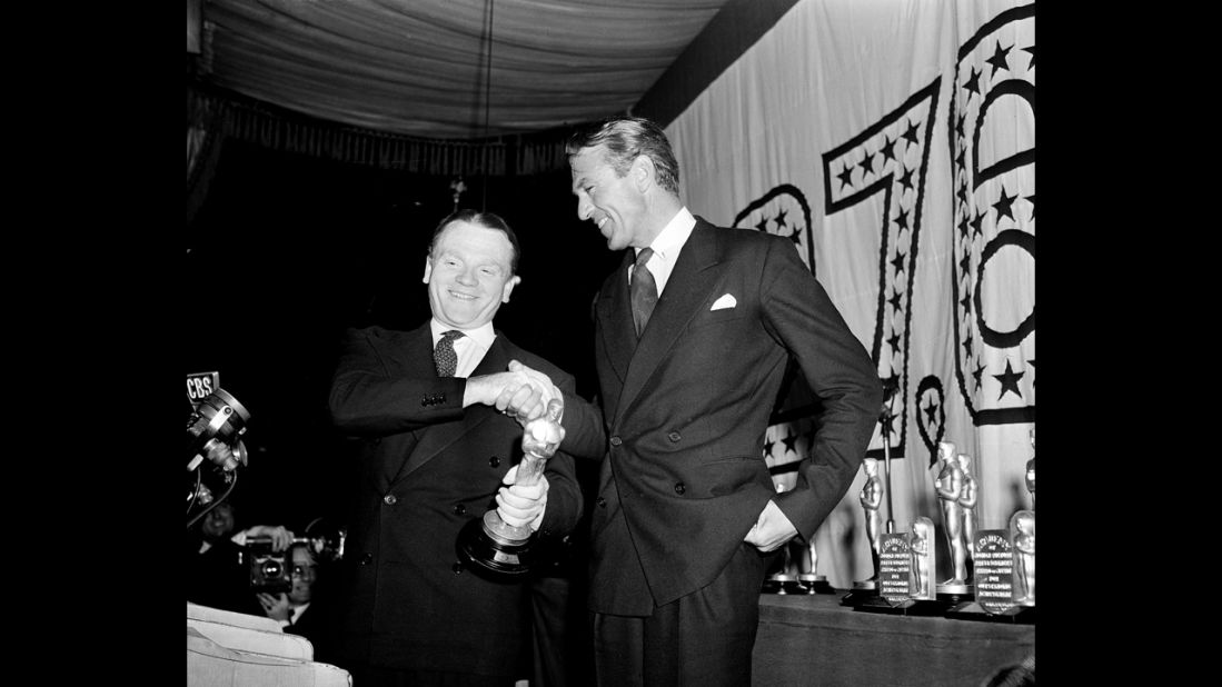 <strong>James Cagney (1943):</strong> Gary Cooper, right, congratulates James Cagney for his best actor win in "Yankee Doodle Dandy" at the Oscar ceremony held in 1943. Cooper, also a nominee for "The Pride of the Yankees," didn't seem to hold a grudge against Cagney. 