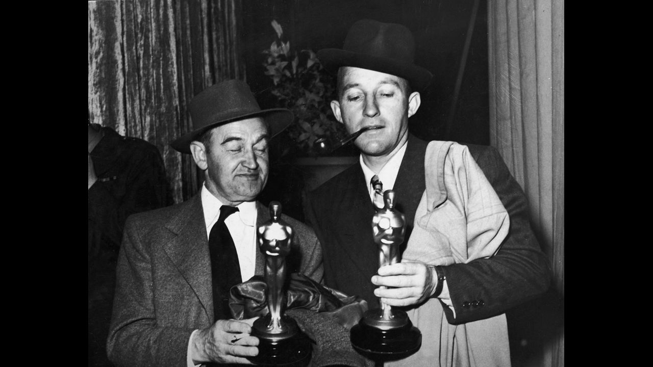 <strong>Bing Crosby (1945):</strong> Bing Crosby, right, and co-star Barry Fitzgerald find a reason to celebrate after the 1945 awards ceremony. They won the best actor and best supporting actor awards, respectively, for "Going My Way."