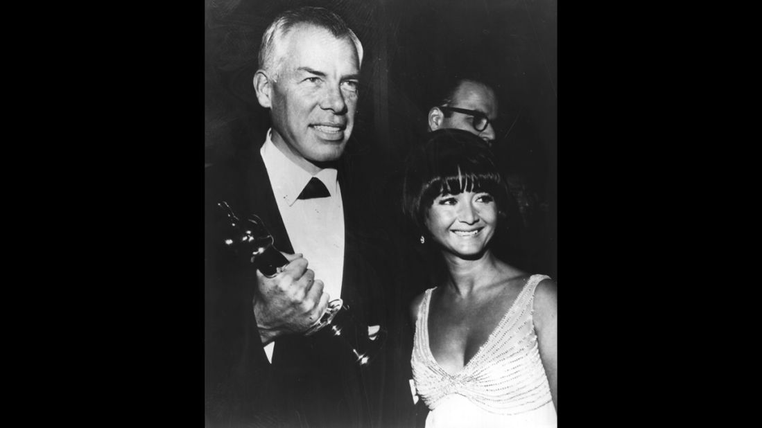 <strong>Lee Marvin (1966):</strong> Lee Marvin won the Oscar for his comic role in "Cat Ballou" over dramatic heavyweights such as Laurence Olivier in "Othello," Richard Burton in "The Spy Who Came in From the Cold," Rod Steiger in "The Pawnbroker" and Oskar Werner in "Ship of Fools." Here, Marvin appears with then-girlfriend Michelle Triola in 1966.