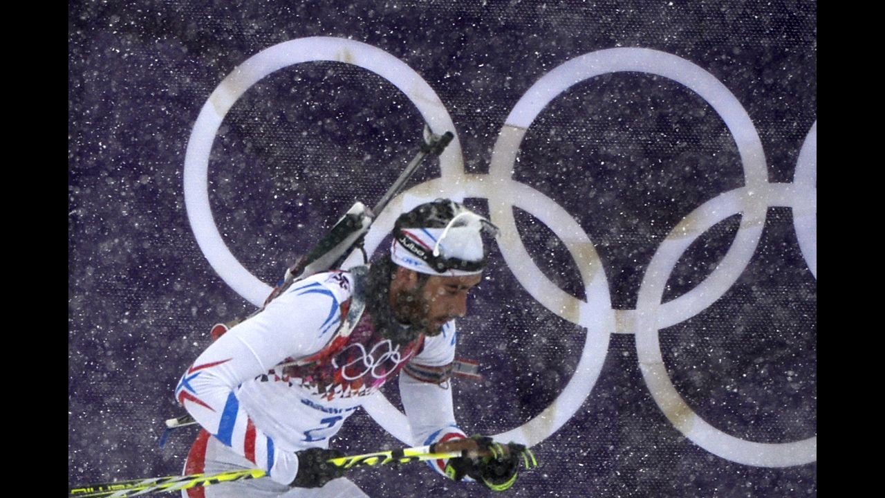 French biathlete Martin Fourcade competes in the 15-kilometer mass start event.