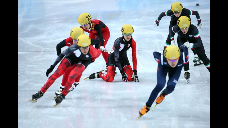 Short track speedskaters compete in the 3,000-meter relay on February 18.