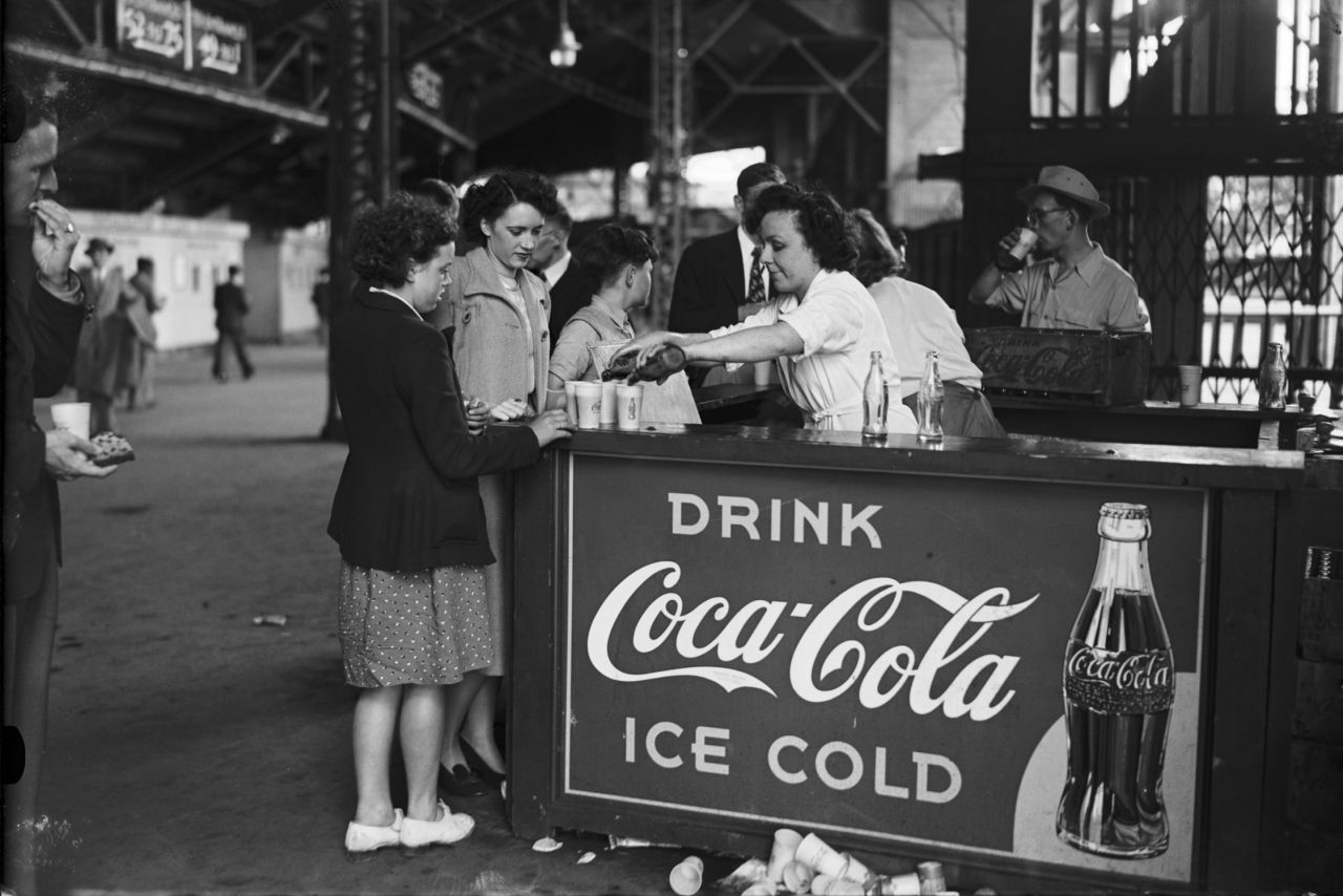 The drink company also has a long-standing partnership with the Olympic committee.  Pictured here is a Coca-Cola stall at Wembley Stadium during the 1948 Olympic Games in London.