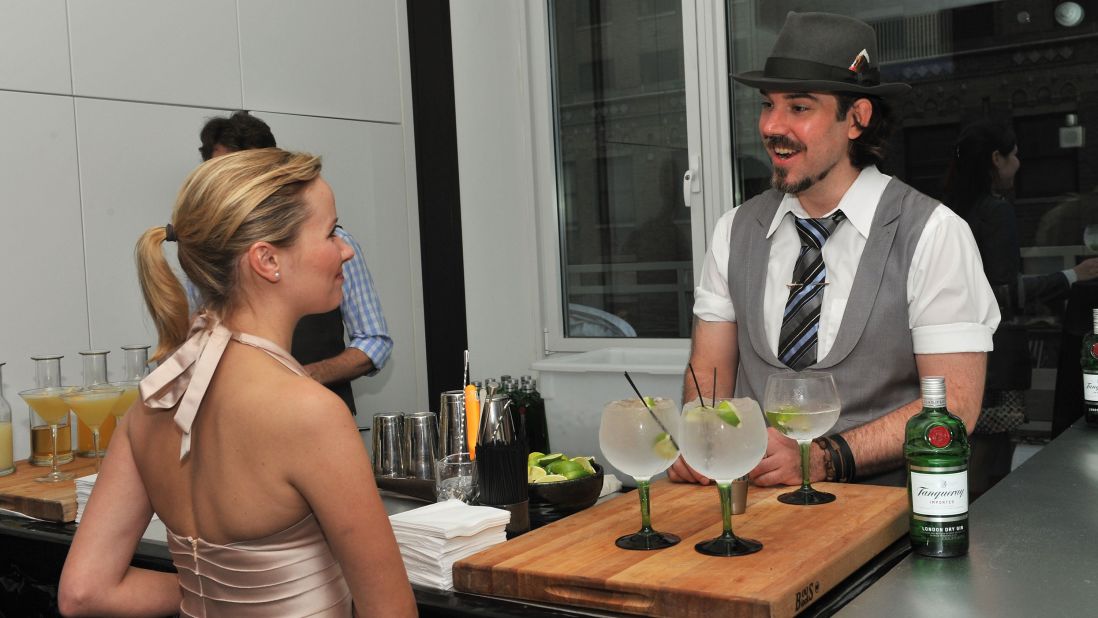 Cocktail fans attend a Tanqueray gin event during the 2011 Manhattan Cocktail Classic in New York. While many festivals have a home base, the cocktail classic lives in the places where tipples are sipped: in the city's best bars, restaurants, hotels and even art museums, galleries, theaters and libraries.