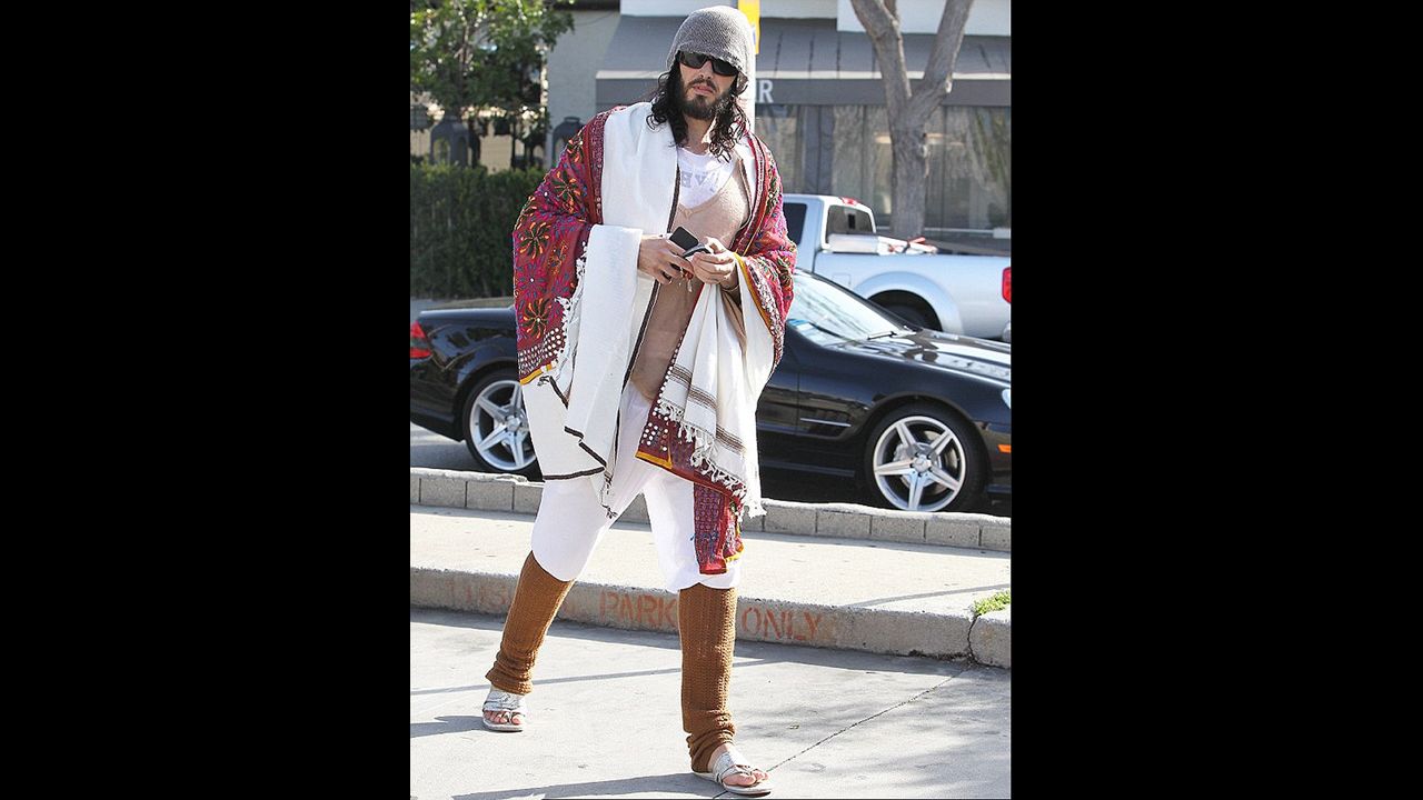 Actor Russell Brand wears legwarmers, a shawl and knit layers while out and about -- not even at his house or a yoga studio.