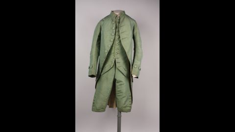 For nearly two centuries, a man in America would not leave his house without wearing a complete suit. Drinking coffee -- or more likely tea or drinking chocolate -- in an 18th century cafe would have compelled a man to display an outfit of finery. This three-piece suit would have been worn by someone in the upper class.