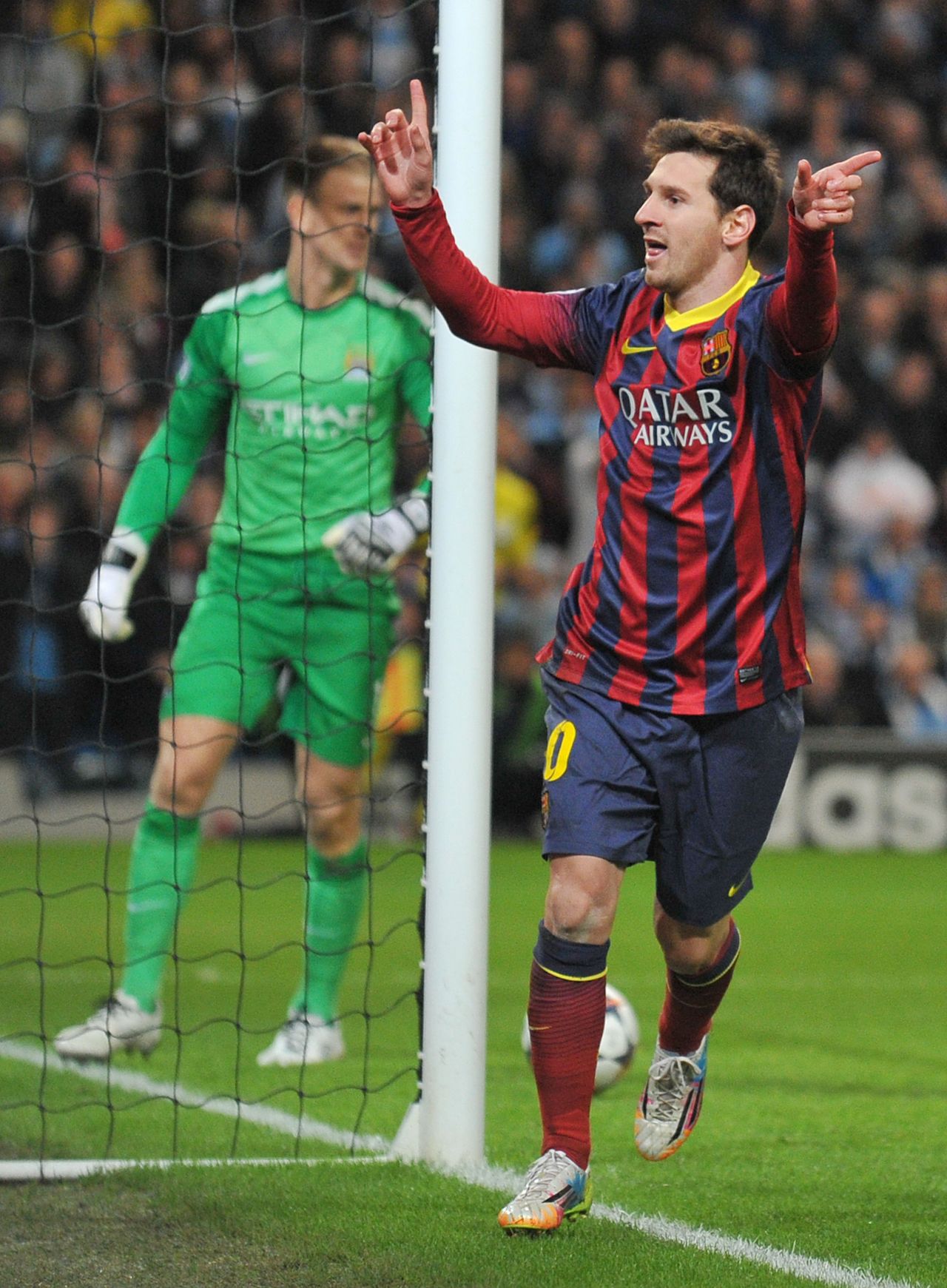 Lionel Messi celebrates after making the breakthrough at Manchester City from the penalty spot. Messi now has seven goals in this season's Champions League. 