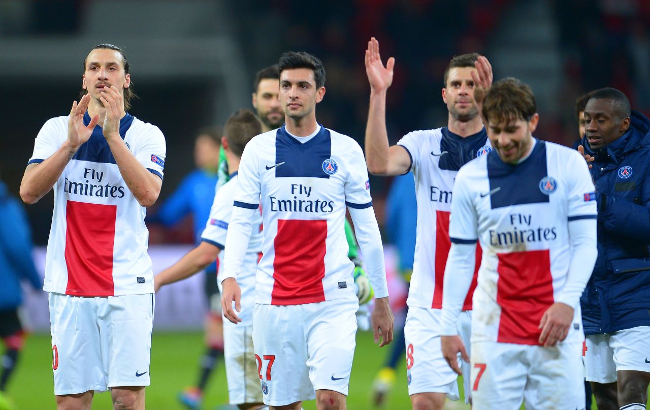 PSG players applaud their fans after their 4-0 victory all but guarantees their place in the quarterfinals. 
