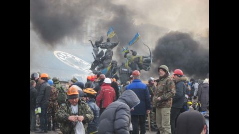 KIEV, UKRAINE:  After the deaths of 25 people during clashes a day earlier, Ukrainian protesters prepare to stand and fight again on February 19.  Photo taken by CNN's Andrew Carey on February 19. 