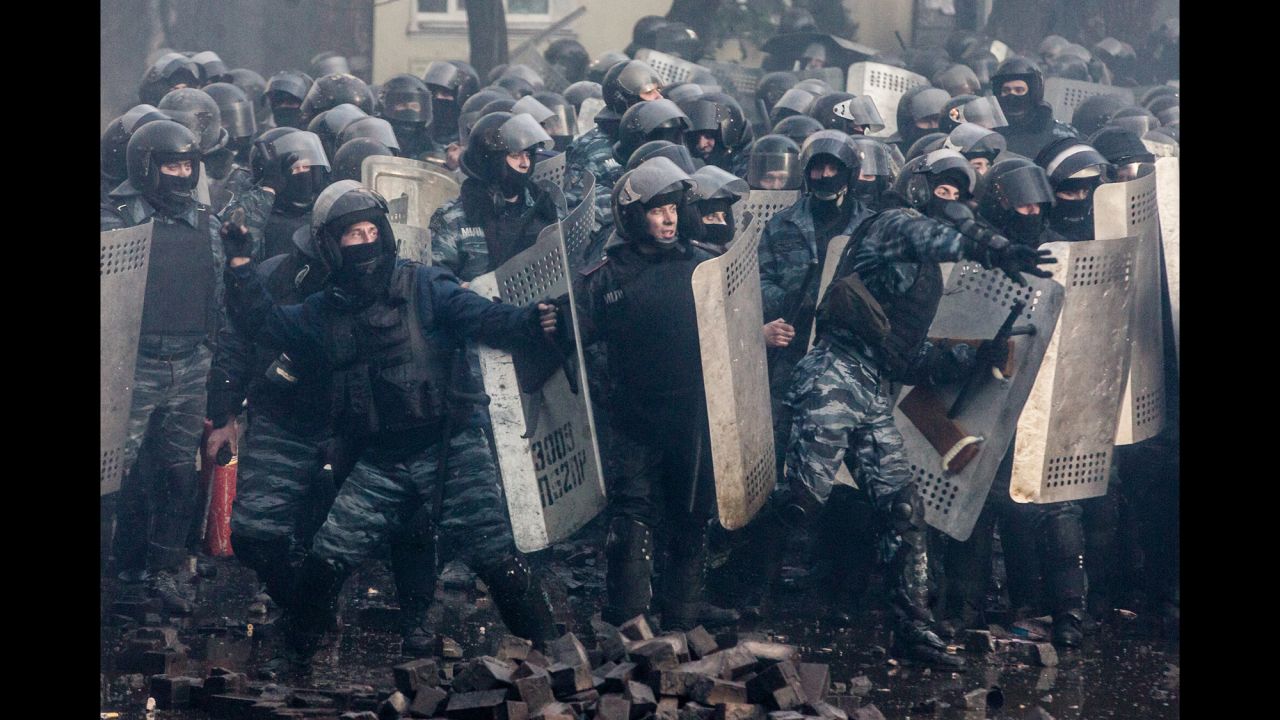 Riot police stand firm in Kiev on February 18.