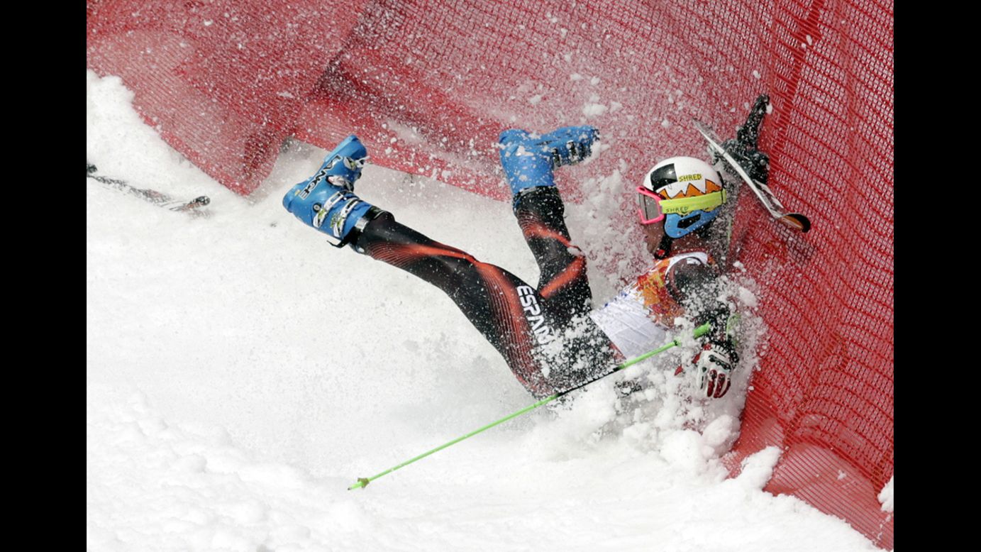 Spain's Alex Puente Tasias crashes in the first run of the men's giant slalom.