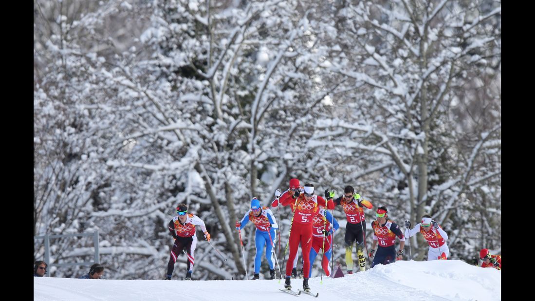Cross-country skier Dario Cologna of Switzerland leads the pack during the men's team sprint on February 19.