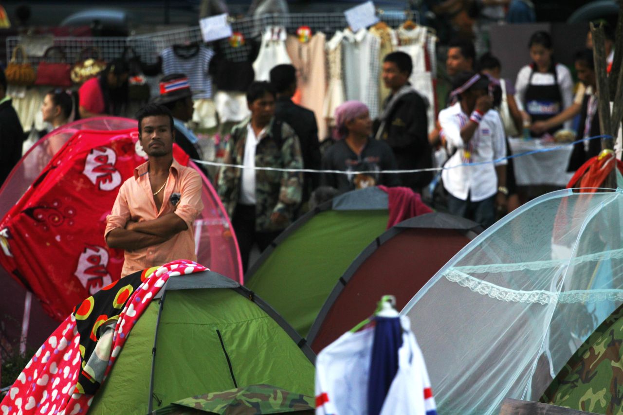 Protesters stand near their tents in Bangkok, where they have been camping out since November 2013. "The atmosphere was peaceful ... though some tension was to be read from the protestors' faces," Kowalska said.