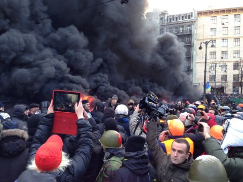 <a href="http://ireport.cnn.com/docs/DOC-1077690">David Solomon</a>, who was visiting Ukraine, spotted heavyweight boxer Vitali Klitschko (shown in the center wearing a fur hat) at a January 23 protest in Kiev. "This high-profile person came to this seemingly menacing environment to show his supporters that he does indeed stand by them, and he literally did."