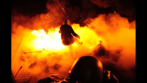 Protesters clash with police in Independence Square on February 19.