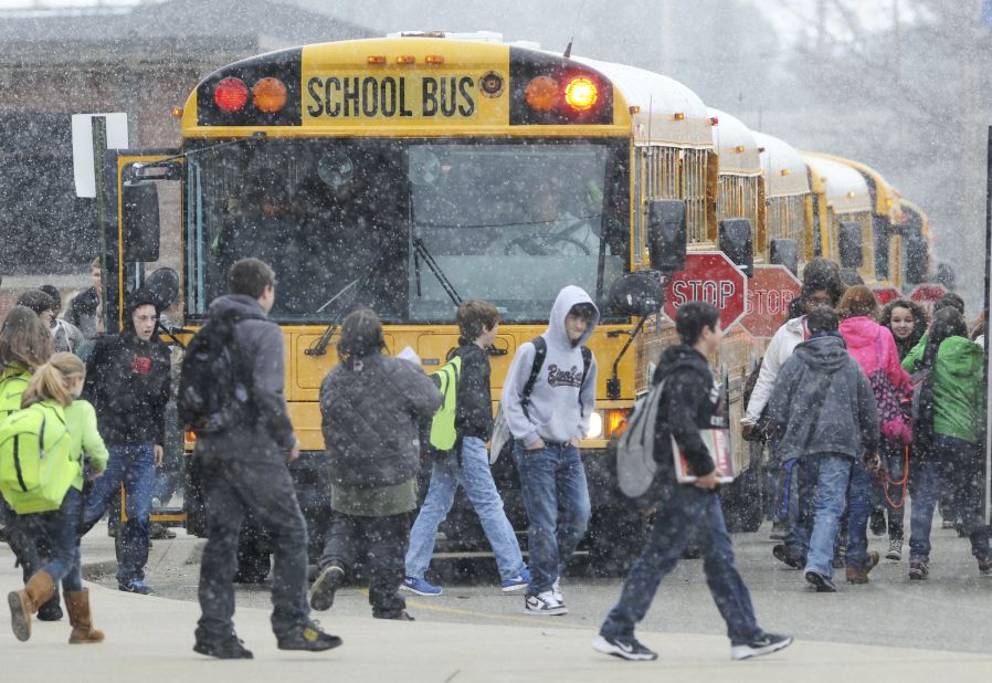 Students from Henderson County, Kentucky, headed to buses after an early dismissal due to weather on February 4. Around the state, several districts held school on President's Day, while others cut back on planned days off.
