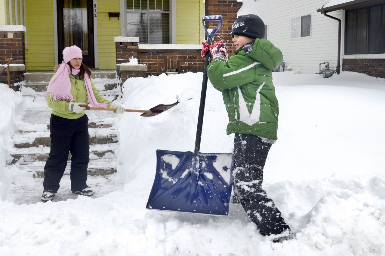 Students in Rossville, Indiana, will be attending school on Saturdays to make up for 10 snow days the district had called by mid-February, <a href="http://wlfi.com/2014/02/11/teachers-feeling-the-effects-of-snow-days/" target="_blank" target="_blank">CNN affiliate WLFI reported</a>. Here, a mother and child cleared snow in northern Indiana after several inches fell in early February. <br />