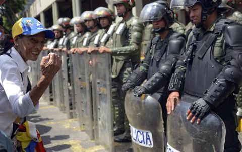 A supporter of Venezuelan opposition leader Leopoldo Lopez protests outside of the Palace of Justice in Caracas on February 19.