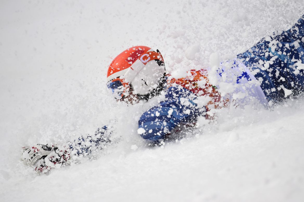 Venezuelan skier Jose Antonio Pardo Andretta crashes during his first run in the giant slalom Wednesday, February 19.