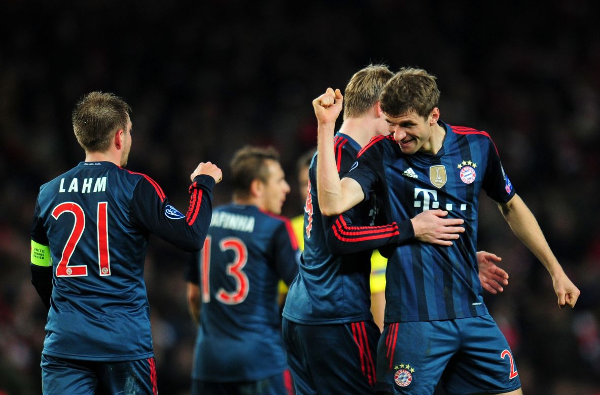 Thomas Muller headed home a late second to wrap up an impressive first leg victory at Emirates Stadium.