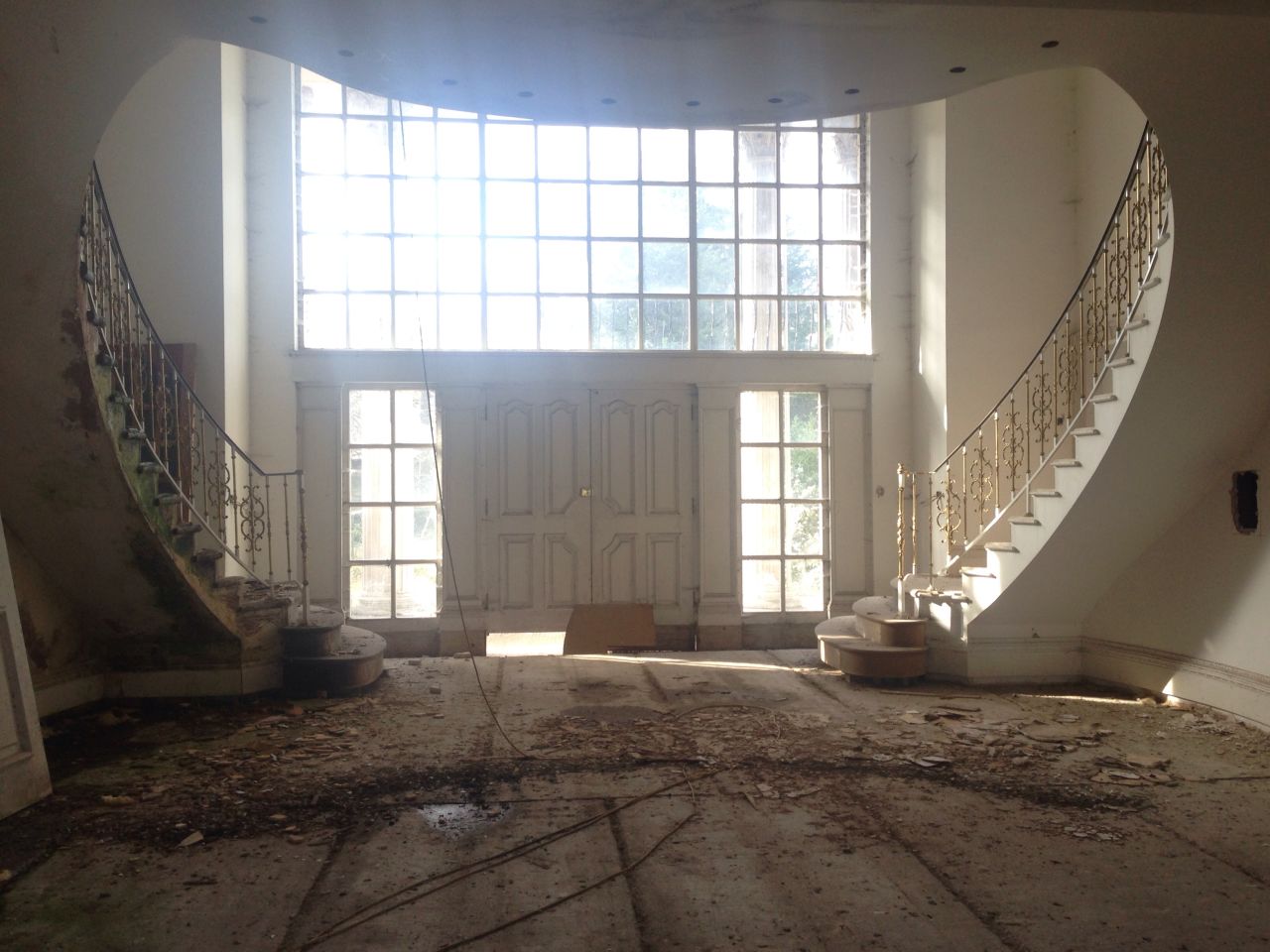 The mansion was never lived in because of planning permission complications. Pictured here is its entrance hall.