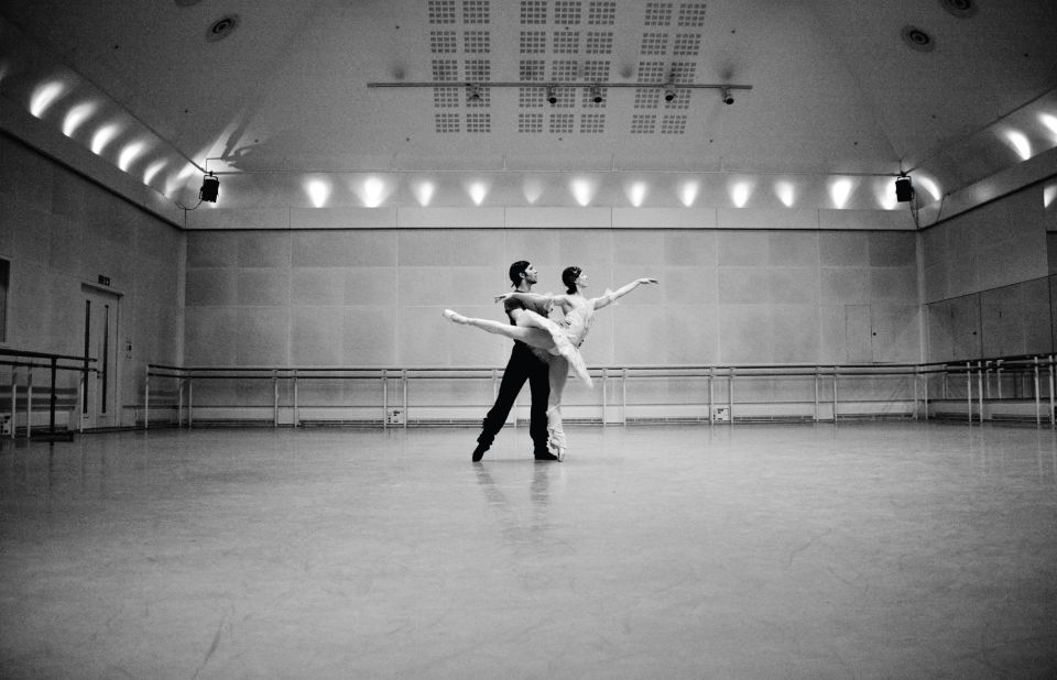 The book includes intimate portraits of the off-stage lives of  dancers including Tamara Rojo, Carlos Acosta, and Federico Bonelli. Here, <strong>Alina Cojocaru</strong> and fiancee <strong>Johan Kobborg</strong> rehearse. 
