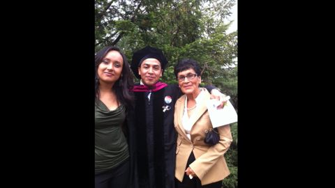 Cesar Vargas at his law school graduation with Erika Andiola, left, and his mother, Teresa Galindo.