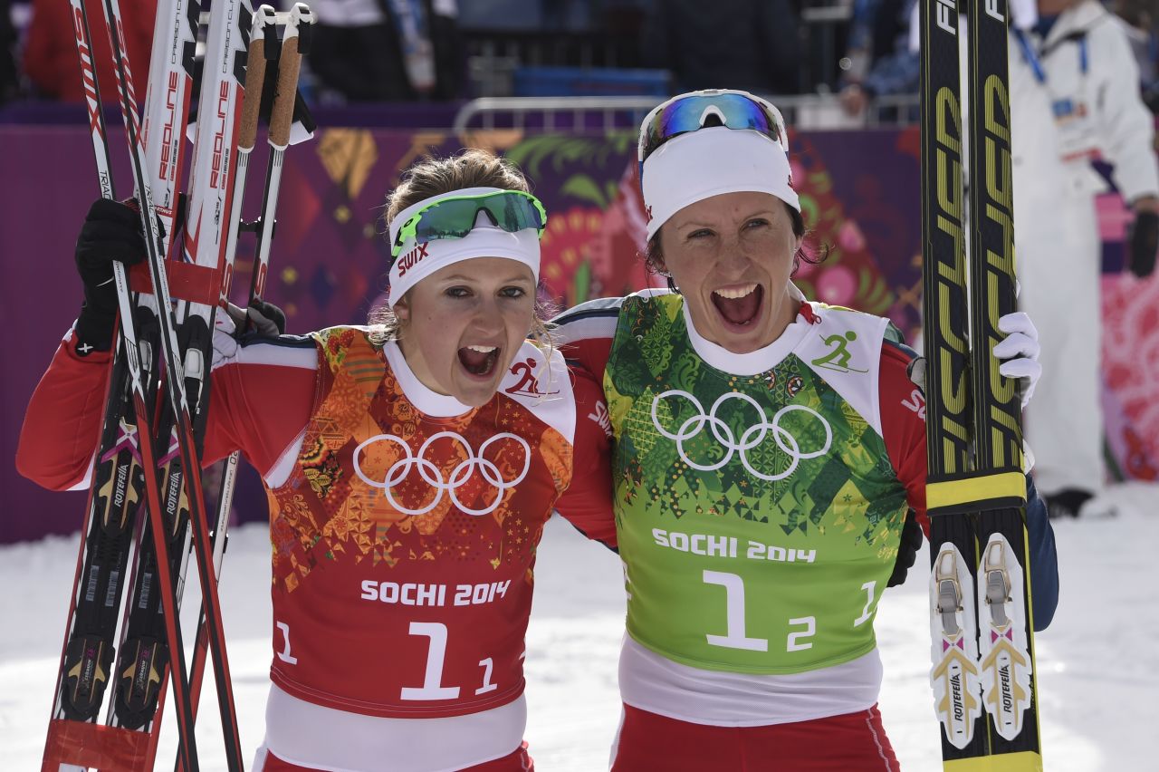 Norway also won the women's cross country team sprint, with Marit Bjoergen (right) claiming her second gold of the games alongside Ingvild Flugstad Oestberg.