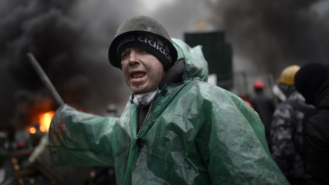 A protester shouts during clashes with police on February 20.