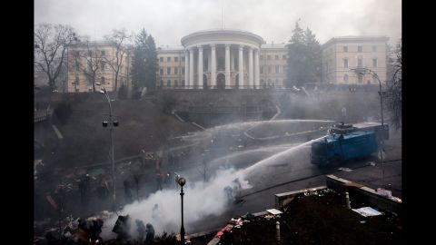 Police use water cannons against protesters in Kiev on February 20.