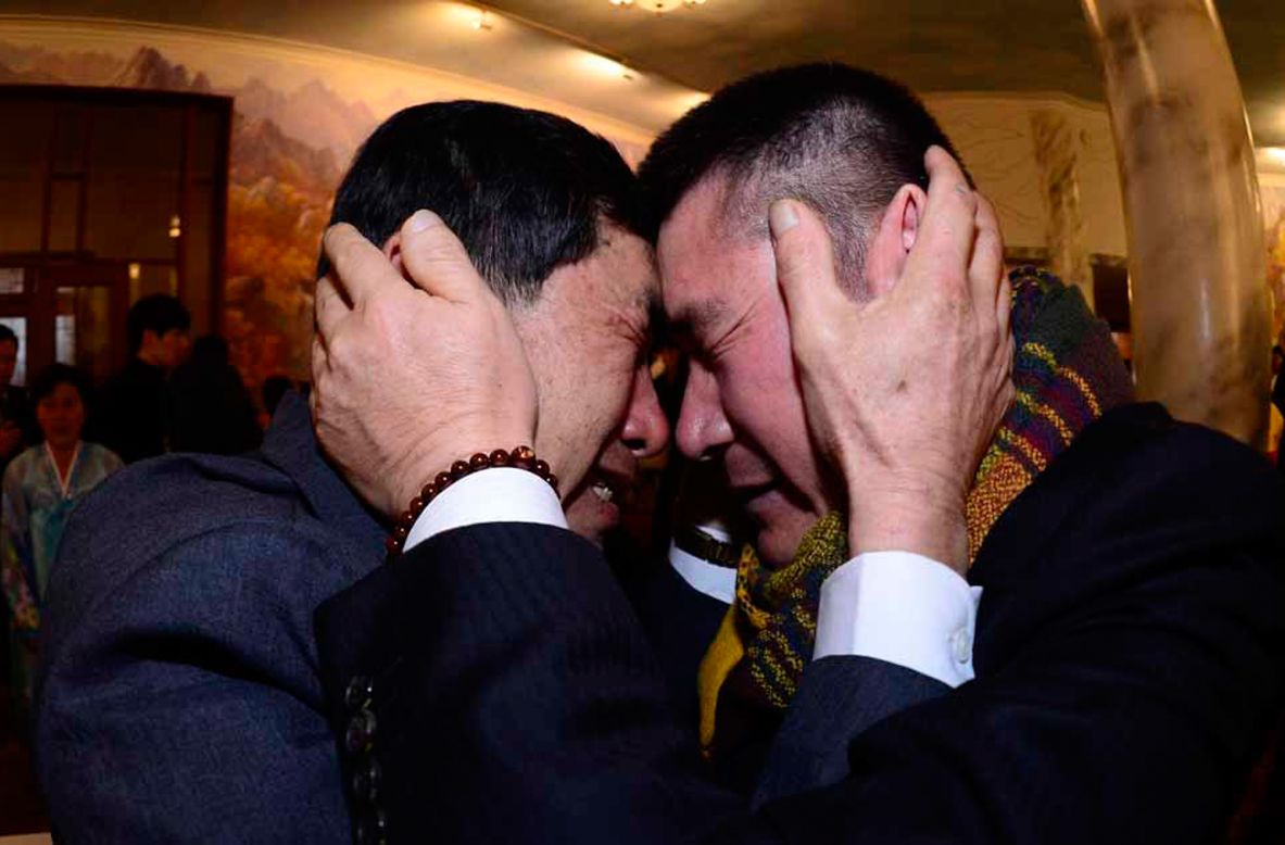 FEBRUARY 20 - MOUNT KUMGANG, NORTH KOREA: South Korean Park Yang-Gon (left) embraces his North Korean brother Park Yang-Soo during a family reunion after being separated for 60 years. The event, which allows <a href="http://cnn.com/2014/02/20/world/asia/koreas-reunion/index.html?hpt=hp_c3">reunions of family members separated by the Korean War</a>, is a result of a recent agreement between North and South Korea that had been suspended since 2010. 