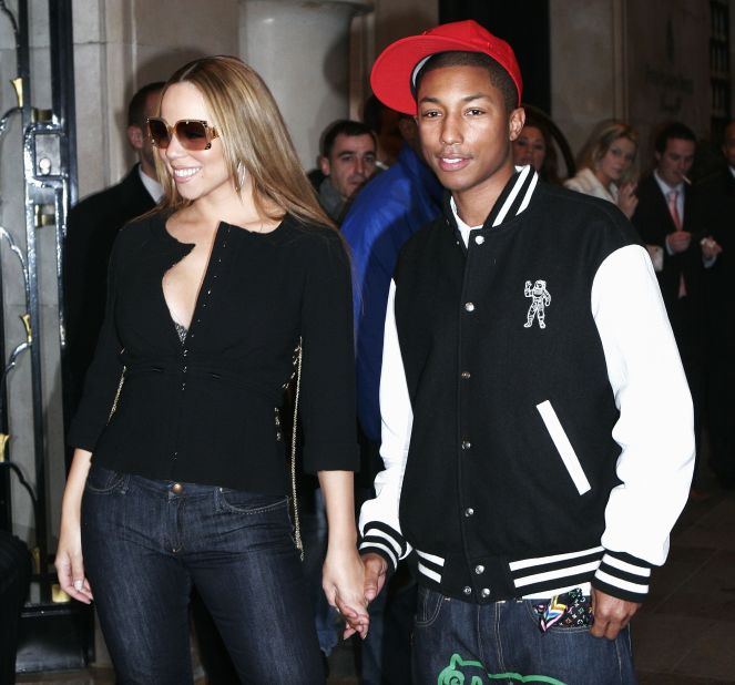 We'd have a glow, too, if we hung out with Mariah Carey, as Pharrell did in Paris in March 2006. The pair were shooting scenes for a music video to go with their single, "Say Somethin.'"  