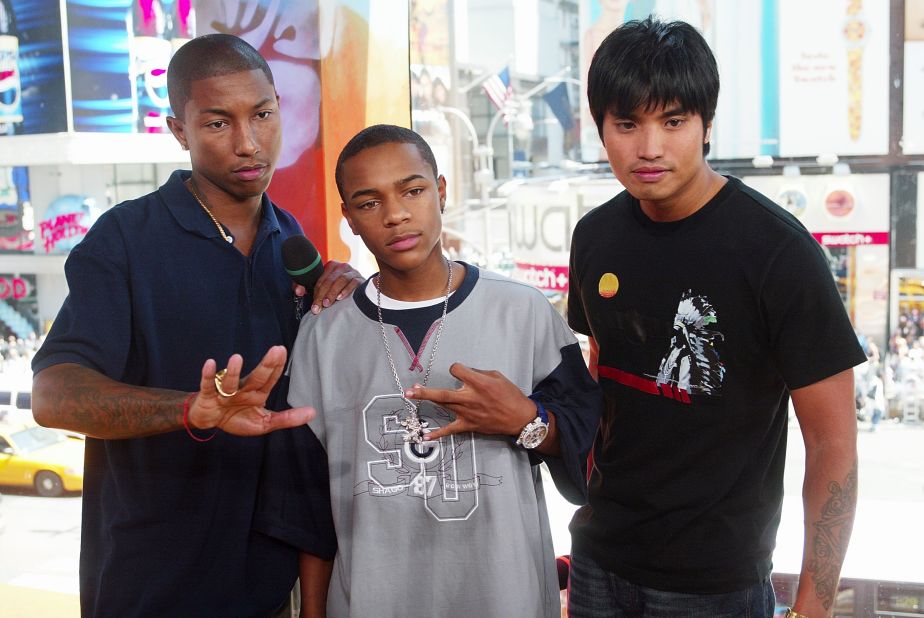 We know it's hard to tell, but Pharrell Williams, left, and rapper Bow Wow, center, actually aren't the same age. When this photo was taken in August 2003, Williams was 30 and Bow Wow was 16. (That's Williams' musical partner in crime, Chad Hugo of their production group The Neptunes, on the right.) 