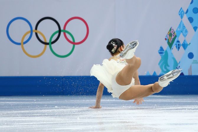 Akiko Suzuki of Japan falls during the figure skating competition February 20.