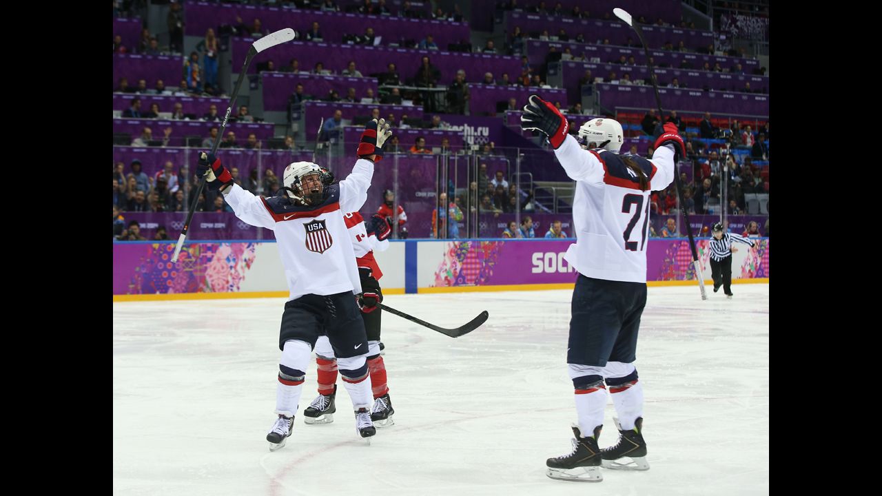 Alex Carpenter, left, and American teammate Hilary Knight celebrate Carpenter's third-period goal during the Canada game on February 20.