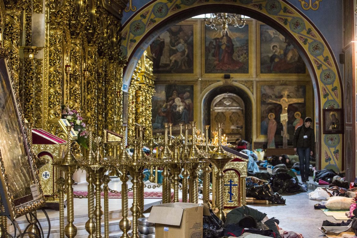 Protesters were given shelter and medical assistance at the Mykhailovsky Cathedral in Kiev. The cathedral opened its doors for protesters wounded during the clashes with riot police Wednesday and Thursday.
