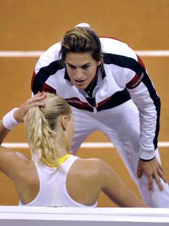 Long-standing Fed Cup representative Alize Cornet says Mauresmo -- seen here encouraging Kristina Mladenovic -- is the best captain she has played for during her six years on the team.