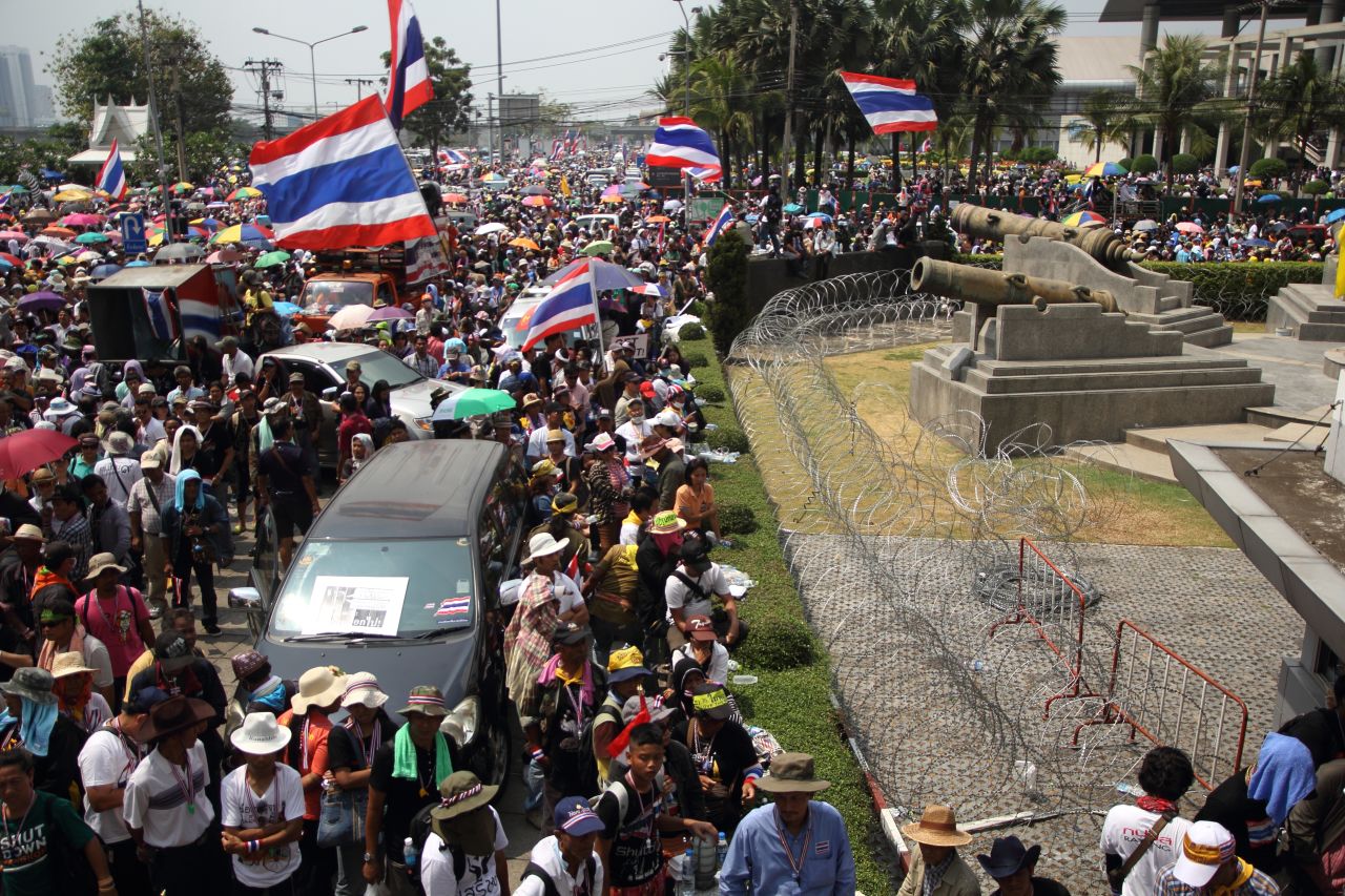 Protesters rally in front of the defense ministry complex in Bangkok on February 19. The demonstrators want to replace Yingluck's government with an unelected "people's council" to see through electoral and political changes.